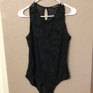 See through black leotard